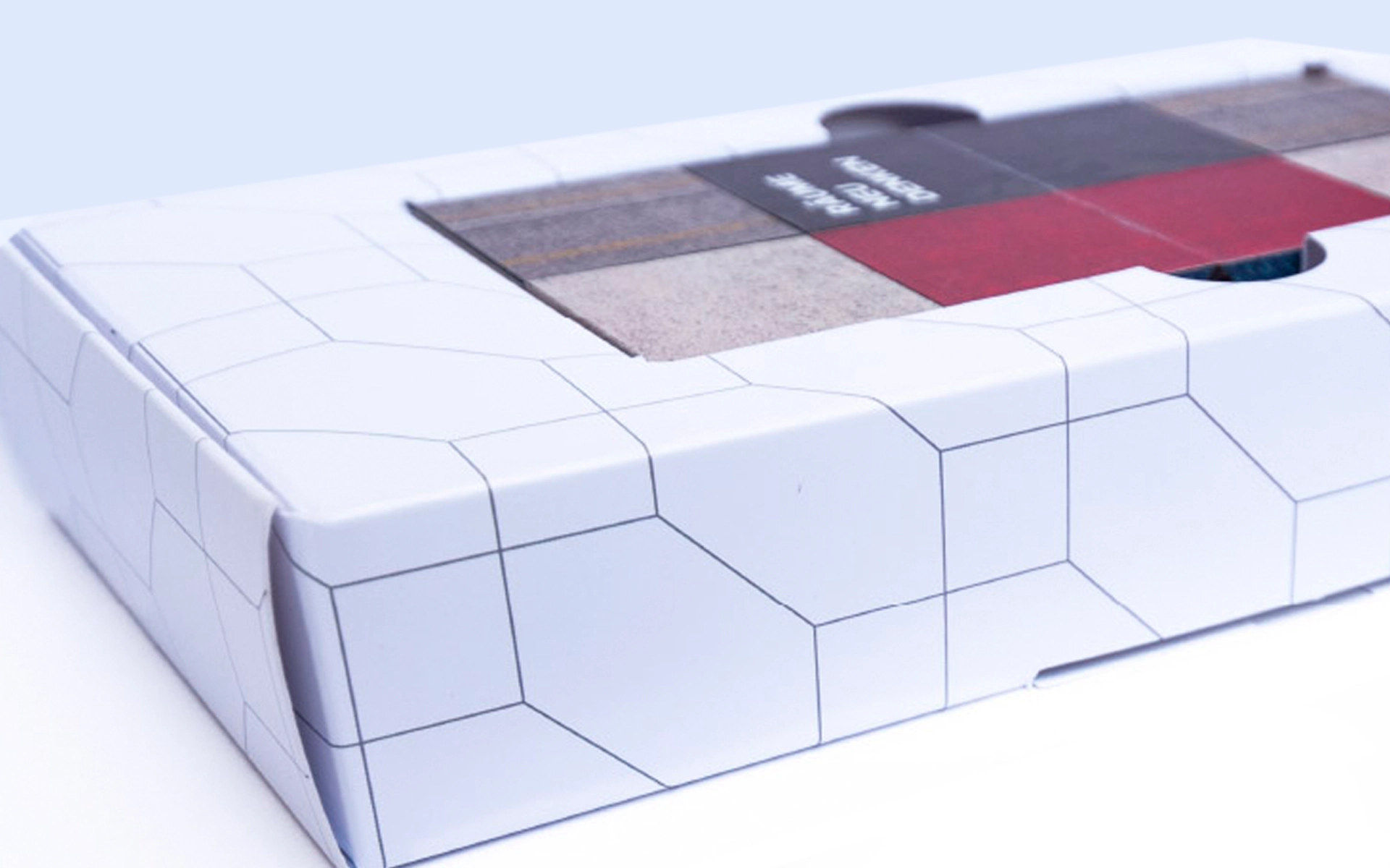 Close-up of the B2B mailing from Amtico for architects and office outfitters, focusing on mailing packaging and content. Concept and design by the R211 agency.