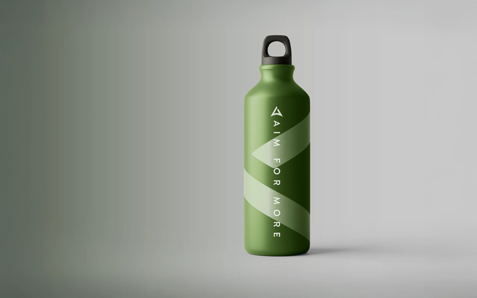Photograph of a water bottle in the Branding of Athletic Archery – with logo and design elements of the brand. Implementation by R211 agency.