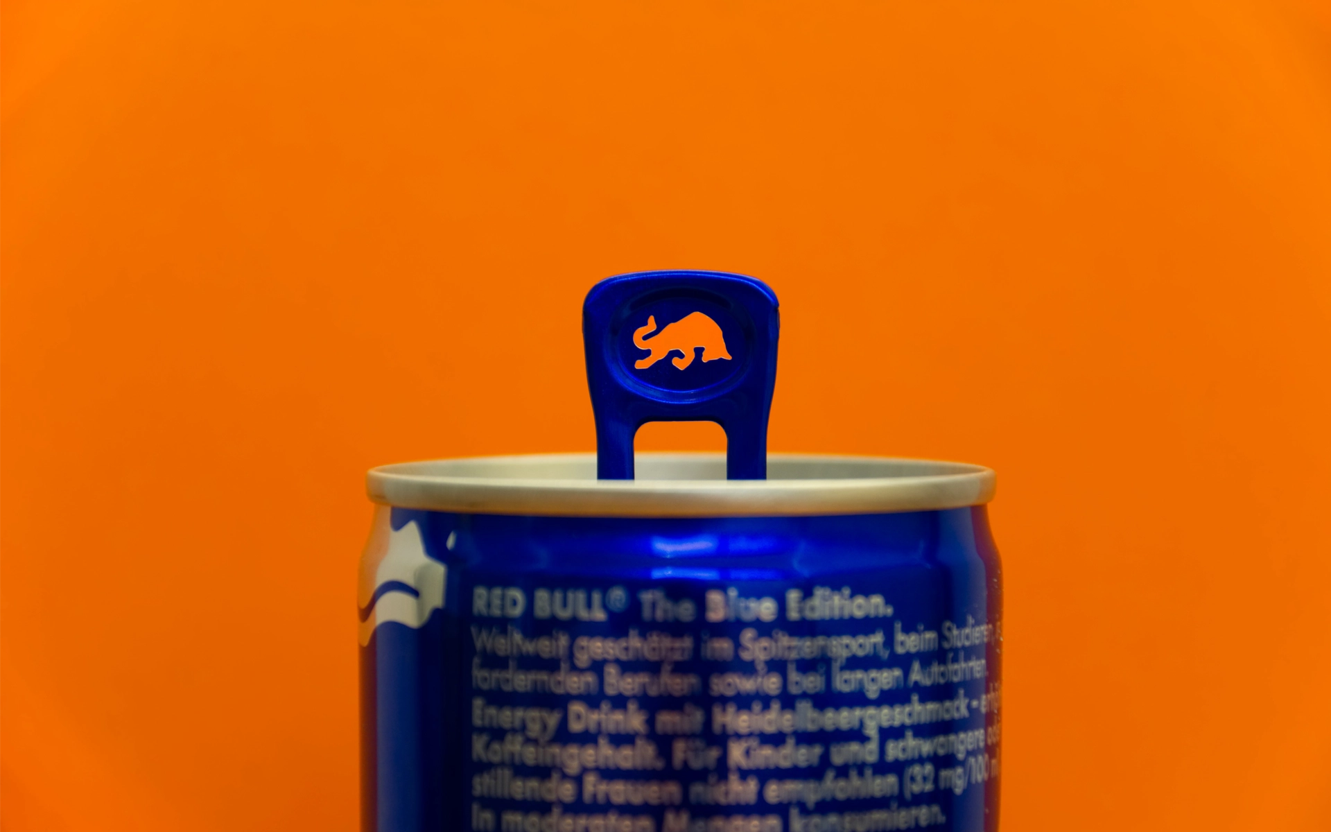 Detail shot of a Red Bull can, where the brand logo was punched out in the opening clip – as an example of how consistently brand and Branding can be conceived and implemented down to the smallest detail.