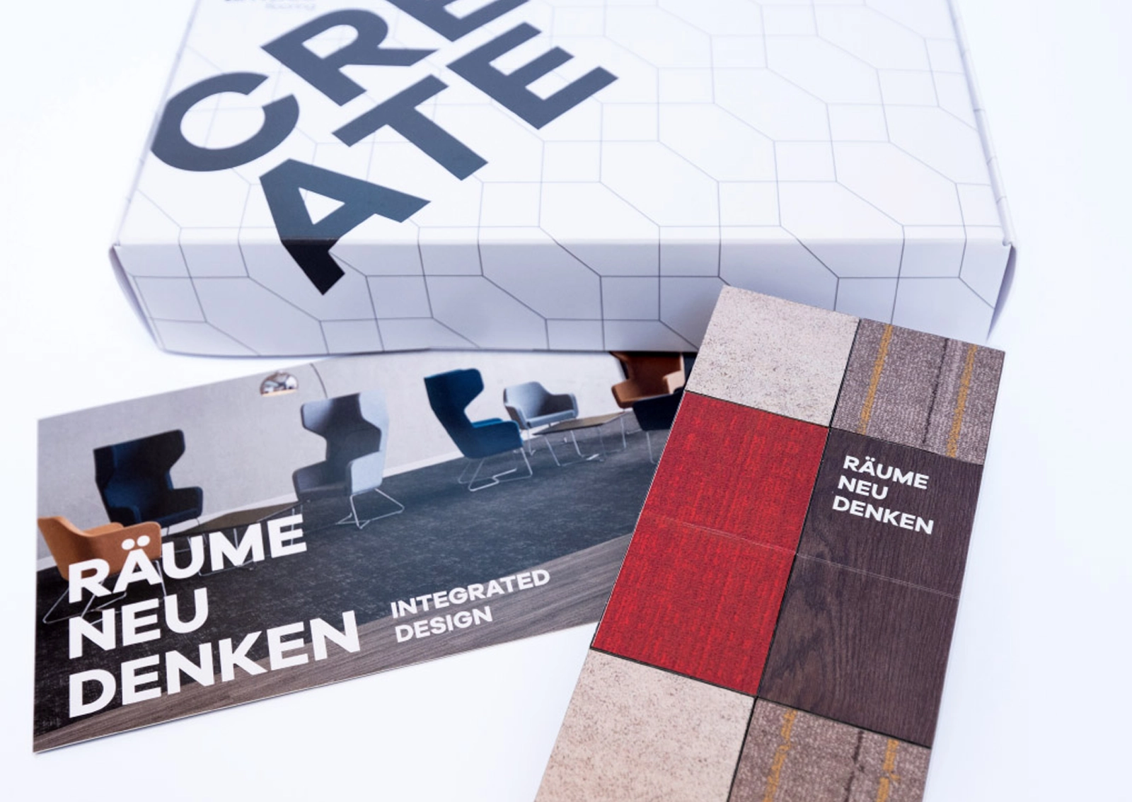 View of the components of the Amtico mailing on the topic 'Flooring – Rethinking Spaces'.