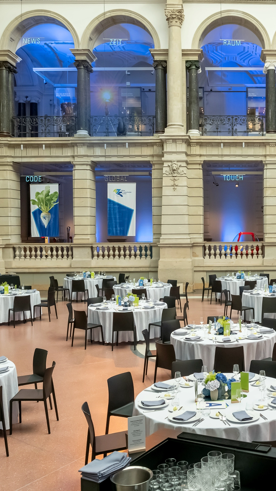 View of the anniversary event at the Museum of Communication, Berlin, with flags for the Economic Association of Sugar e. V.