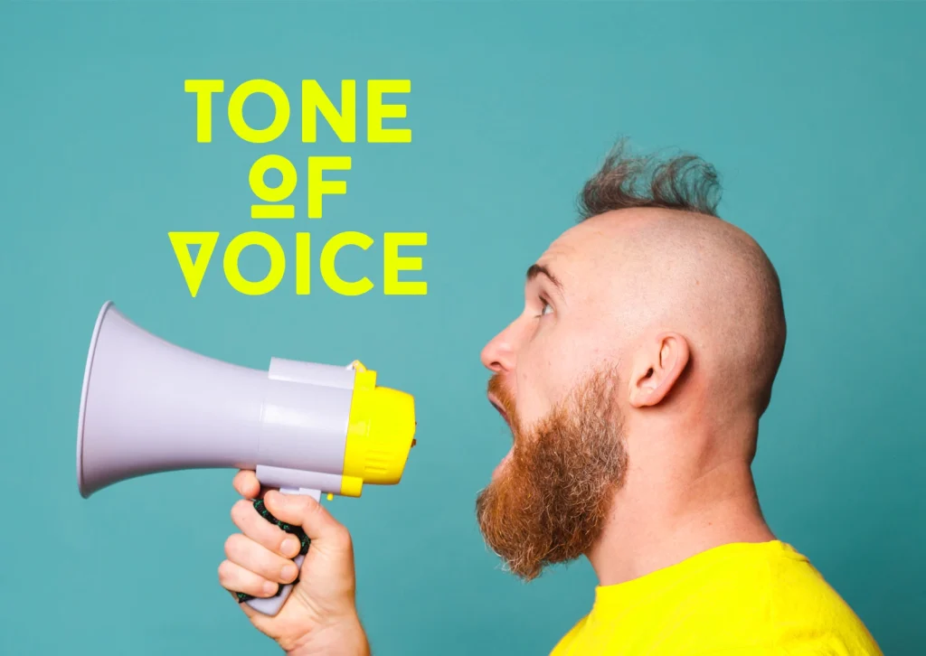 A man shouts into a megaphone above which stands "Tone of voice"
